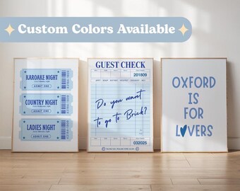 May include: Three framed prints with blue text on a white background. One print features karaoke, country, and ladies night tickets. Another says "Guest Check" with the question "Do you want to go to Brick?" The last print reads "Oxford is for Lovers."