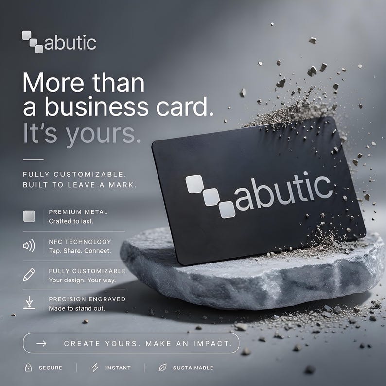May include: A black business card with the word "abutic" in white. The card is on a grey stone, with text that reads "More than a business card. It's yours." Additional text describes features like premium metal and NFC technology.