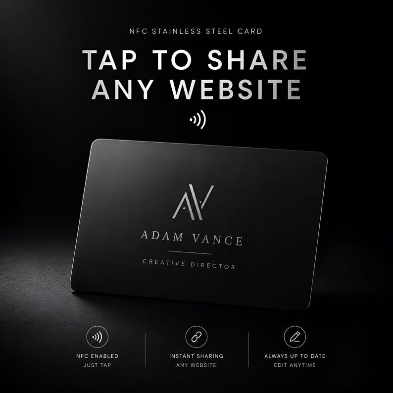 May include: A black NFC stainless steel card with the text "TAP TO SHARE ANY WEBSITE." The card features the initials "AV" and the name "ADAM VANCE, CREATIVE DIRECTOR." Additional text includes "NFC ENABLED JUST TAP," "INSTANT SHARING ANY WEBSITE," and "ALWAYS UP TO DATE EDIT ANYTIME."
