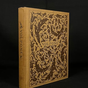 May include: A brown book with a decorative cover featuring a floral pattern in dark brown. The title "VOLPONE" is printed on the cover.