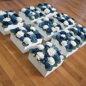 Royal blue and white feather centerpiece …  Royal blue centerpieces, Blue  centerpieces, Royal blue wedding