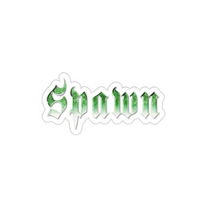May include: A white sticker with the word "Spawn" in a gothic font. The text is green with a glittery effect, and the edges have a white outline. The sticker is designed to be cut out.