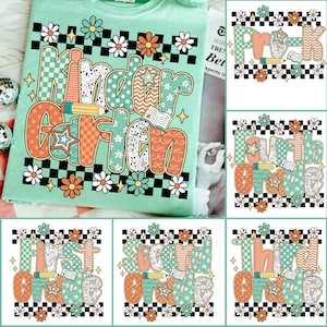 May include: A light green t-shirt with the word "Kindergarten" in a colorful, retro design. The design includes a pencil, open book, flowers, and a checkered pattern. Additional shirts display "Pre-K", "First Grade", "Second Grade", "Third Grade", and "Fourth Grade".