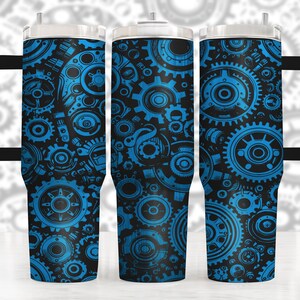 May include: Three stainless steel tumblers with a black and blue gear pattern. The tumblers have a black handle and a clear lid.