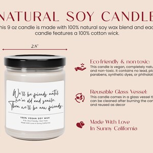 The image is a candle labeled as a natural soy candle. It features a glass jar with a black lid, and the candle is made with 100% natural soy wax. The candle is eco-friendly and non-toxic, and it is reusable after burning. The candle is made in Sunny, California.