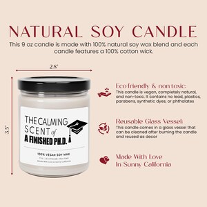 The image is a product advertisement for a natural soy candle. It features a soy candle labeled "The Calming Scent of a Finished PhD" and provides details about the candle's eco-friendly and non-toxic nature, as well as its reusable glass vessel. The advertisement also highlights that the candle is made with love in Sunny California.
