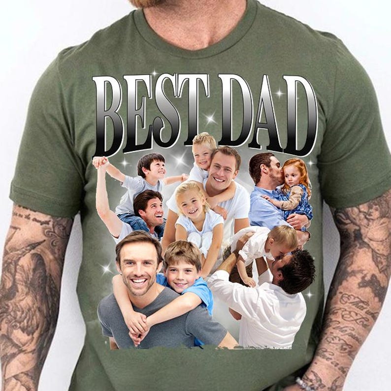 May include: Olive green t-shirt with the text "BEST DAD" in a silver and black font. The shirt features a collage of images of fathers and children. The design includes multiple fathers with their children in various poses.