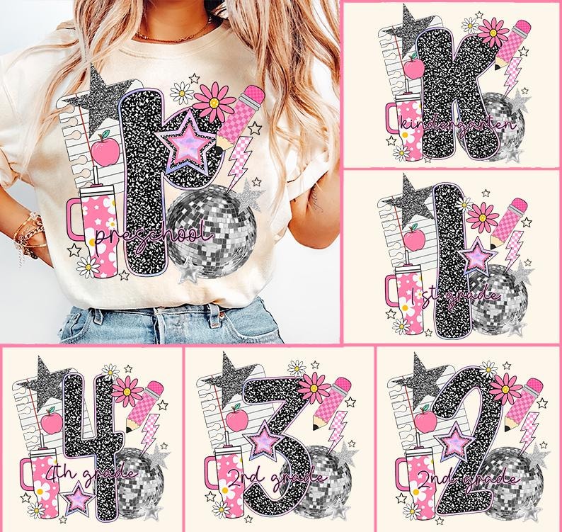 May include: Cream-colored t-shirt with a large graphic featuring the word "Preschool" and other grade levels. The design includes a disco ball, stars, flowers, a pencil, and a pink tumbler. The shirt is decorated with glitter.