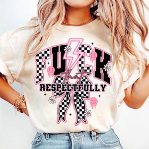 May include: White t-shirt with a black and white checkered bow and the text "F*CK THAT RESPECTFULLY" in black with pink accents.