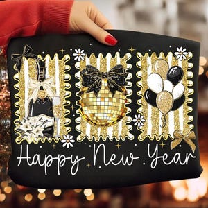 May include: Black tote bag with a festive New Year's design. Features a champagne bottle, disco ball, and balloons, all framed with gold stripes and bows. The words "Happy New Year" are written in white script.
