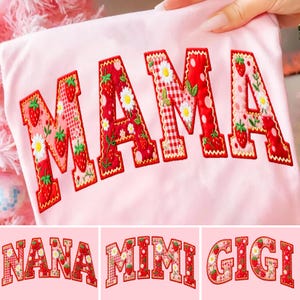 May include: Pink t-shirt with the embroidered word "MAMA" in red, white, and pink strawberry and floral patterns. Below are three additional designs with the words "NANA", "MIMI", and "GIGI" in a similar style.