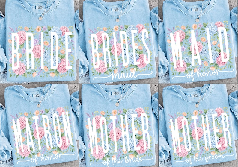May include: Light blue crewneck sweatshirts with floral designs and text for a bridal party. The text includes "Bride," "Bridesmaid," "Maid of Honor," "Matron of Honor," "Mother of the Bride," and "Mother of the Groom."