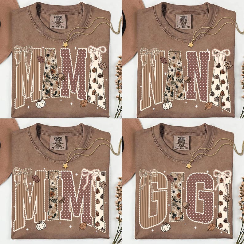Peut inclure: Quatre t-shirts marron avec de grandes lettres majuscules formant MAMA, NANA, MIMI et GIGI. Chaque lettre est orn&eacute;e de rayures, de pois et d'imprim&eacute;s floraux ou de citrouilles, agr&eacute;ment&eacute;e de n&oelig;uds blancs, de petites &eacute;toiles et de feuilles.