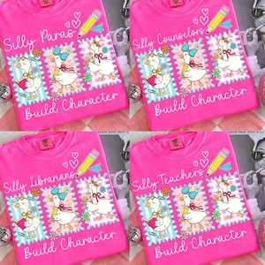 May include: Hot pink t-shirts with a graphic featuring cartoon geese in a stamp design. Each shirt has a different title: "Silly Paras," "Silly Counselors," "Silly Librarians," and "Silly Teachers." The phrase "Build Character" is also printed on each shirt.