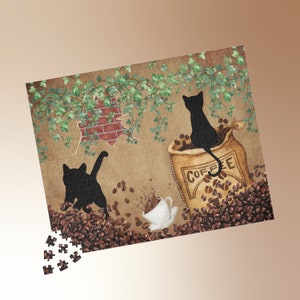 May include: A black and white illustration of two black cats sitting on a bag of coffee beans. The bag is labeled "COFFEE". The cats are surrounded by coffee beans and ivy.