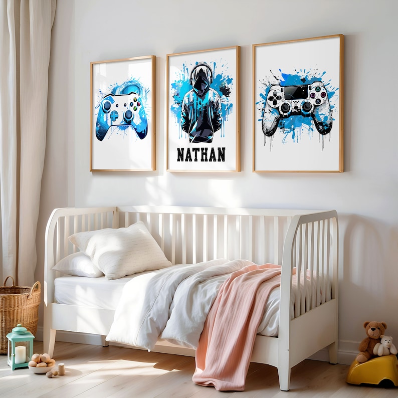 May include: Three framed prints with a blue and white color scheme. The prints feature a gamer with headphones, a video game controller, and the name "NATHAN".