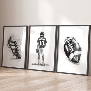 May include: Three black and white watercolor illustrations of sports equipment. The first image shows a football cleat, the second shows a football player wearing a jersey with the name "Nathan" and the number "10", and the third shows a football.