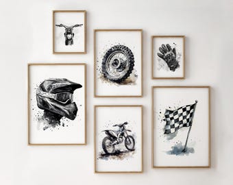 May include: Set of six framed watercolor prints featuring motocross-themed illustrations. The prints depict a helmet, motorcycle parts, a motorcycle, a checkered flag, and a glove, all in black and white with gold frames.