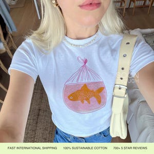 Goldfish Baby Tee Retro Aesthetic Simple Graphic Baby Tee Vintage y2k Painted Womens Coquette Baby Tee Womens Trending Graphic Tee