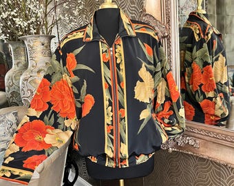 Chaqueta con cremallera y estampado botánico floral en naranja y amarillo intenso de GDT
