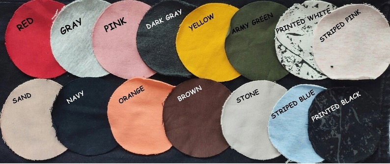 Puede incluir: Una colecci&oacute;n de muestras de tela en varios colores y patrones, incluyendo rojo, gris, rosa, gris oscuro, amarillo, verde militar, blanco estampado, rosa a rayas, arena, azul marino, naranja, marr&oacute;n, piedra, azul a rayas, negro estampado.