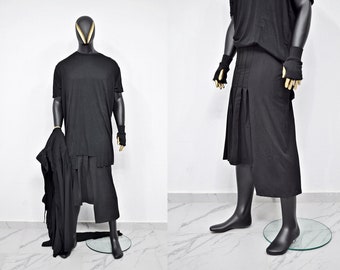 May include: A black, long, pleated skirt with a straight hemline. The skirt is made of a soft, flowing fabric and has a relaxed fit.