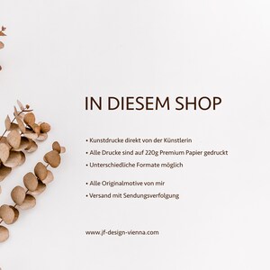 May include: A white informational graphic featuring a dried eucalyptus branch on the left and dark brown text that reads IN DIESEM SHOP, followed by a list of bullet points detailing art prints on 220g paper and the website www.jf-design-vienna.com.