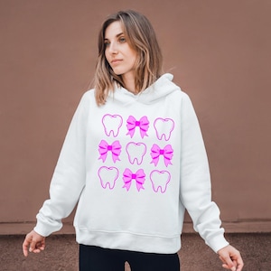 Coqueta dental PNG, Higiene dental Png, Lazo rosa, Dientes, Diseños de camisetas dentales, Diseño de sublimación, Escuadrón dental, DESCARGA INSTANTÁNEA