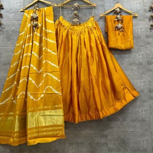 Bright Yellow Silk Lehenga With Multicolor Floral Threadwork And Net Dupatta main image 1
