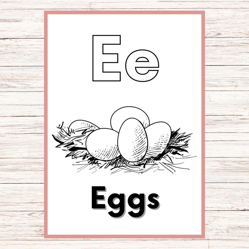 May include: Black and white illustration of the letter E and the word "Eggs" with a drawing of eggs in a nest.