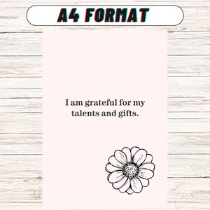 May include: A printable A4 format poster with a pink background, a black and white daisy illustration, and the text "I am grateful for my talents and gifts."