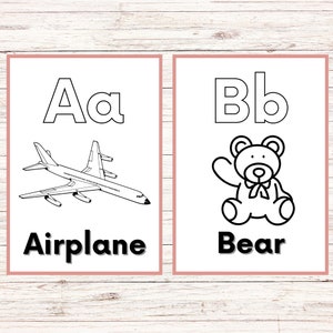 May include: Black and white printable flashcards featuring the letters A and B with corresponding images of an airplane and a bear. The letters are in uppercase and lowercase. The words "Airplane" and "Bear" are written below the images.