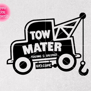 May include: Black and white illustration of a tow truck with the words "Tow Mater" and "Towing & Salvage" written on it. The truck has a hook and the words "Welcome" written on the bottom.