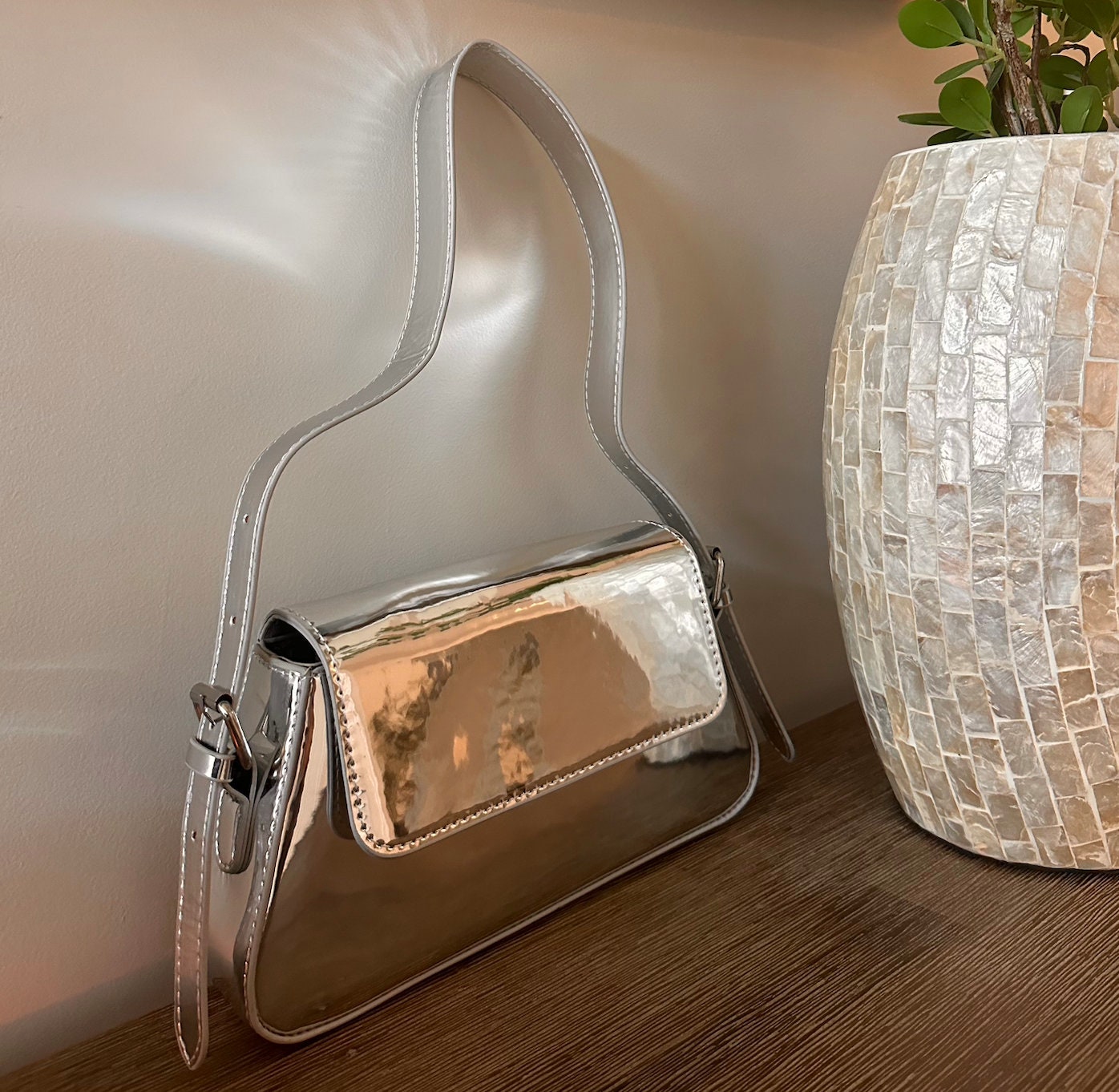 Silver handbags designer hotsell
