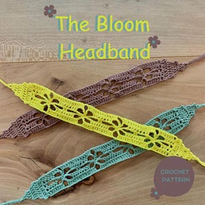 May include: Three crocheted headbands in yellow, brown, and teal, each with a floral design. The text "The Bloom Headband" is displayed above the headbands, and "CROCHET PATTERN" is displayed below. The headbands are laid on a wooden surface.