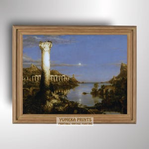May include: A framed vintage painting depicting a classical landscape with a large column in the foreground. The artwork features a river, architectural ruins, and a moonlit sky. The frame is made of light brown wood. The text "Yumeka Prints Printable Vintage Painting" is at the bottom.