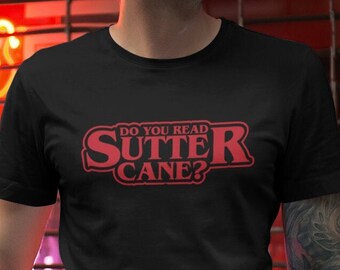 Nerd Filmzitat Lees je Sutter Cane? T-Shirt - John Carpenter - Nerdy Kino Herrenshirt / Unisex - T-shirt - TShirt - Geschenk - Zwart