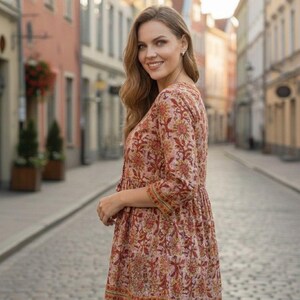 Women wearing a cotton printed kurti with floral ethnic design, featuring 34 sleeves and a comfortable relaxed fit. Lightweight breathable cotton fabric ideal for summer wear, casual outings, office wear, and daily use. Stylish Indian ethnic tunic paired with leggings, perfect for modern women who love traditional fashion.
Cotton printed women’s kurti with floral ethnic design, soft breathable fabric, 3/4 sleeves, comfortable fit. Ideal for casual wear, office use, summer styling,
