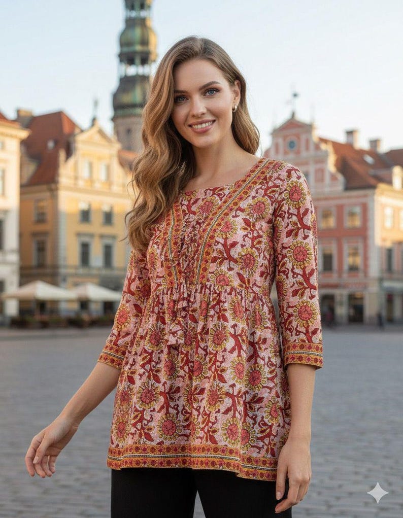Women wearing a cotton printed kurti with floral ethnic design, featuring 34 sleeves and a comfortable relaxed fit. Lightweight breathable cotton fabric ideal for summer wear, casual outings, office wear, and daily use. Stylish Indian ethnic tunic paired with leggings, perfect for modern women who love traditional fashion.
Cotton printed women’s kurti with floral ethnic design, soft breathable fabric, 3/4 sleeves, comfortable fit. Ideal for casual wear, office use, summer styling,