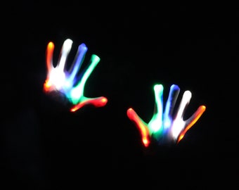 Flashing LED Rave Gloves Suitable for; Raves, Festivals, Night Clubs, Parties, Hen and Stag Dos