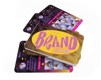 May include: A stack of cards with a yellow and gold background featuring the text "BRAND Beauty" in pink lettering. The cards have a tie-dye pattern and feature photos of people.