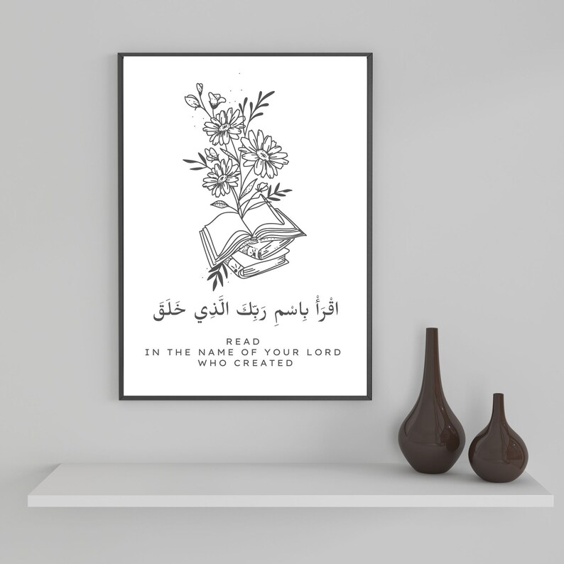 May include: Black and white illustration of a book with flowers on top. The text "Read in the name of your Lord who created" is below the image.