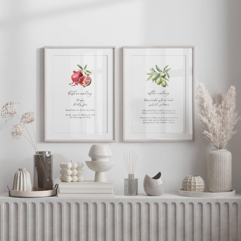 May include: Two framed prints with watercolor illustrations of a pomegranate and an olive branch. The prints have Arabic text and English translations that say "before eating" and "after eating".