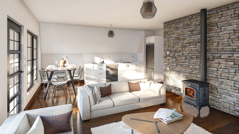 May include: A modern living room with a white couch, a wood coffee table, and a wood-burning stove with a stone surround. The room has large windows and a dining table with chairs.