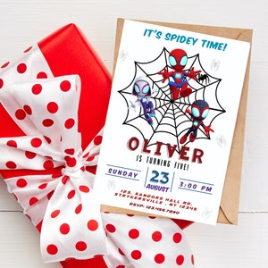 May include: A Spiderman-themed birthday party invitation with a red, blue, and black cartoon Spiderman character on a web. The invitation says "It's Spidey Time!" and "Oliver is turning five!" with a date and time of Sunday, August 23rd at 3:00 PM. The invitation also includes an address and RSVP information.