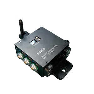 May include: A black MDR-5 wireless receiver with a small antenna, a digital display, and multiple ports. The receiver is labeled "MDR-5" and "Preston Cinema Systems" with the serial number "S/N 1024".
