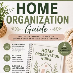 May include: A spiral-bound "Home Organization Guide" with the title in large, dark green letters. The guide promises to help declutter, organize, and simplify. A green circle indicates an instant PDF download. A woven basket and a beige blanket are in the background.