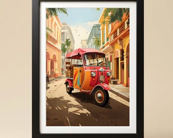 May include: A framed art print featuring a vibrant orange and red three-wheeled auto rickshaw parked on a sunlit street lined with tall, colorful buildings and palm trees. The vehicle has a pink canopy and a distinct multi-colored side panel design.