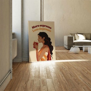 May include: A rectangular wall art print featuring an illustration of a person with long dark hair wearing an orange and red sari, holding a red coffee cup. The text "More espresso Less depresso" is printed in dark red and yellow at the top.