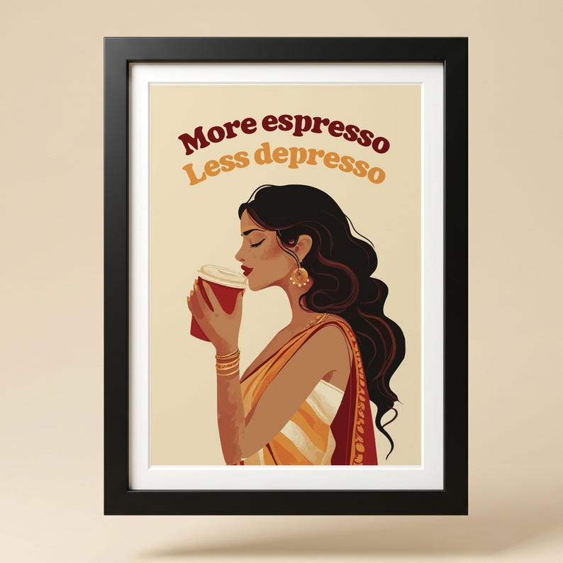 May include: A framed wall art print featuring an illustration of a person with long dark hair wearing a yellow and red garment, holding a red coffee cup. The text More espresso Less depresso is printed in dark red and orange above the figure.